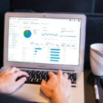 Data analysis report on a laptop screen representing Python for data science