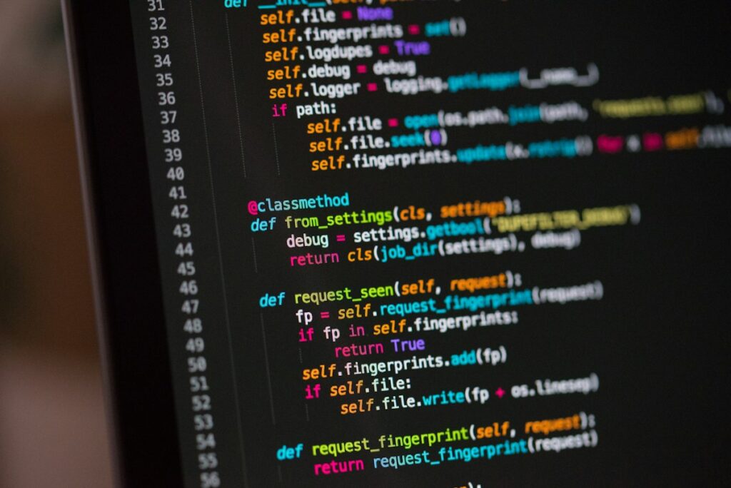 Code on a computer screen representing SQL queries used in data science